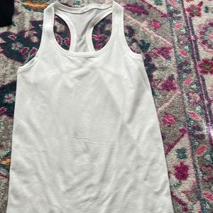 white swiftly tank top